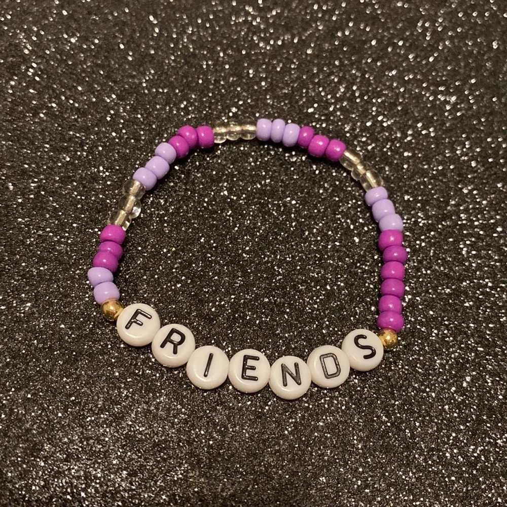 Kids multi purple bead stretch bracelet